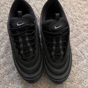 All black with small grey suede and white Nike check 97 AirMax